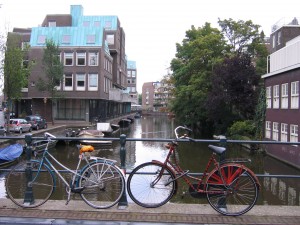 Bikes parked on bridge over canal